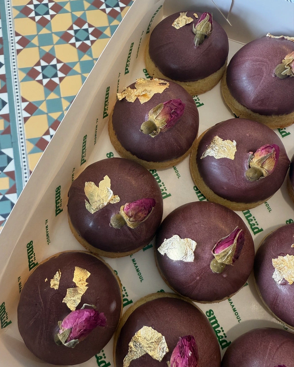 Mini dipped ma'amoul in mauve with rose buds and gold leaf